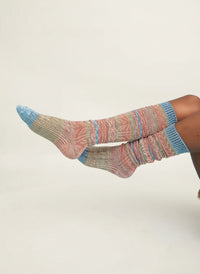 Colorful knitted socks on a light  background
